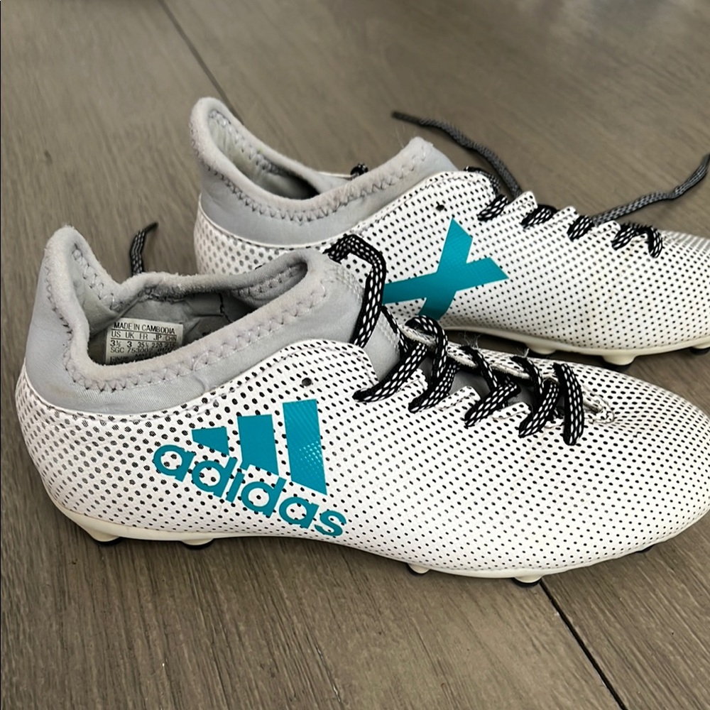 Adidas White and Blue Soccer Cleats Modern Low-Cut Design